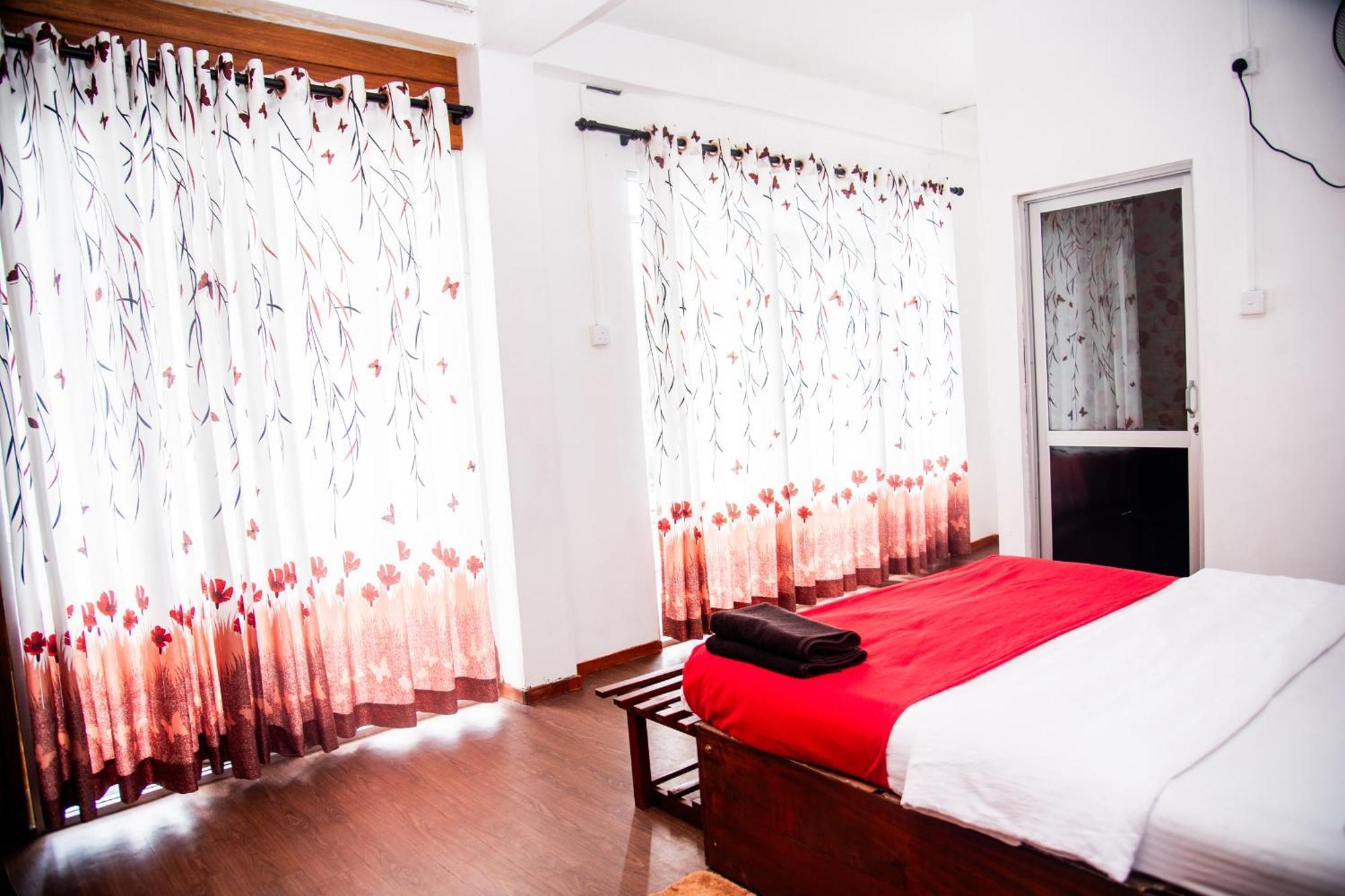 Minthu Homestay Ella Bilik gambar